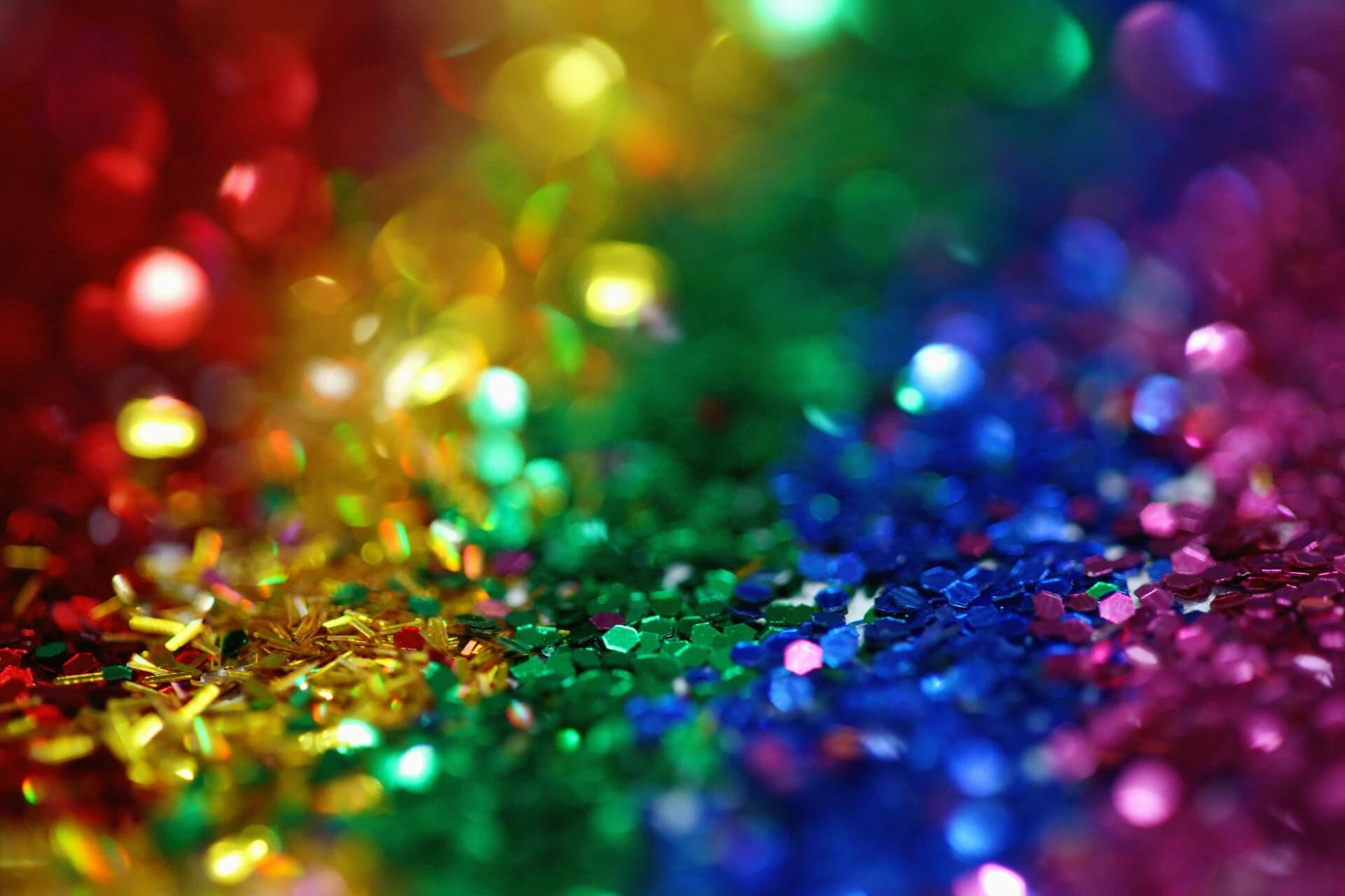 A close up shot of hexagonal glitter in various colors.
